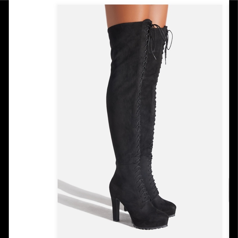 Thigh high wide calf boots